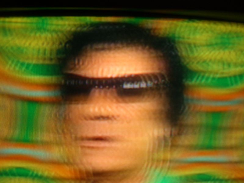 Sometimes it's better to see the world through blurry glasses - Muammar al-Gaddafi (Mu'ammar al-Qaddhafi).